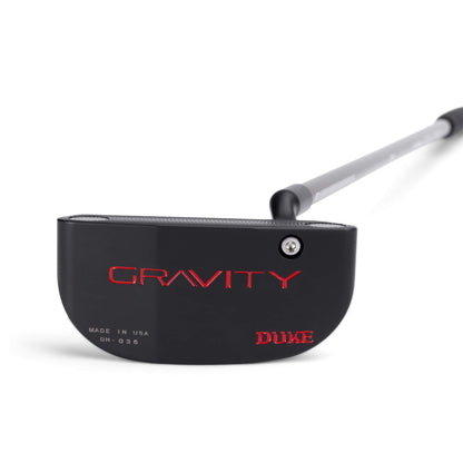 A black putter with "GRAVITY" and "DUKE" written in red on the head.