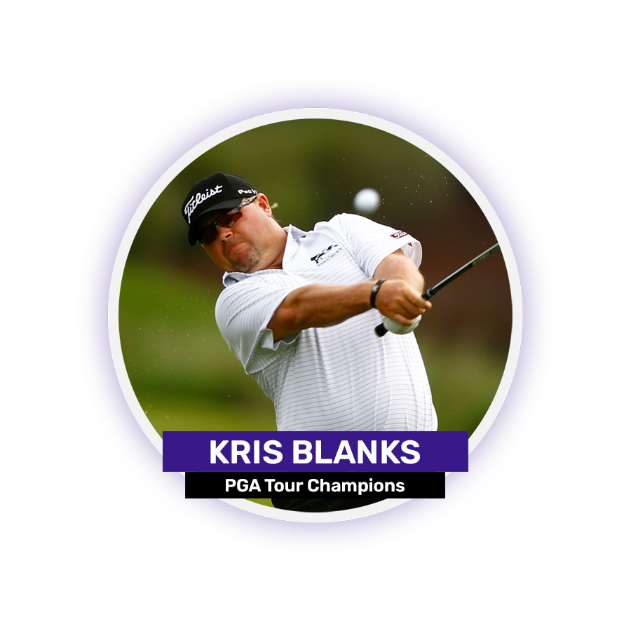 A man in a white polo shirt swings a golf club outdoors.