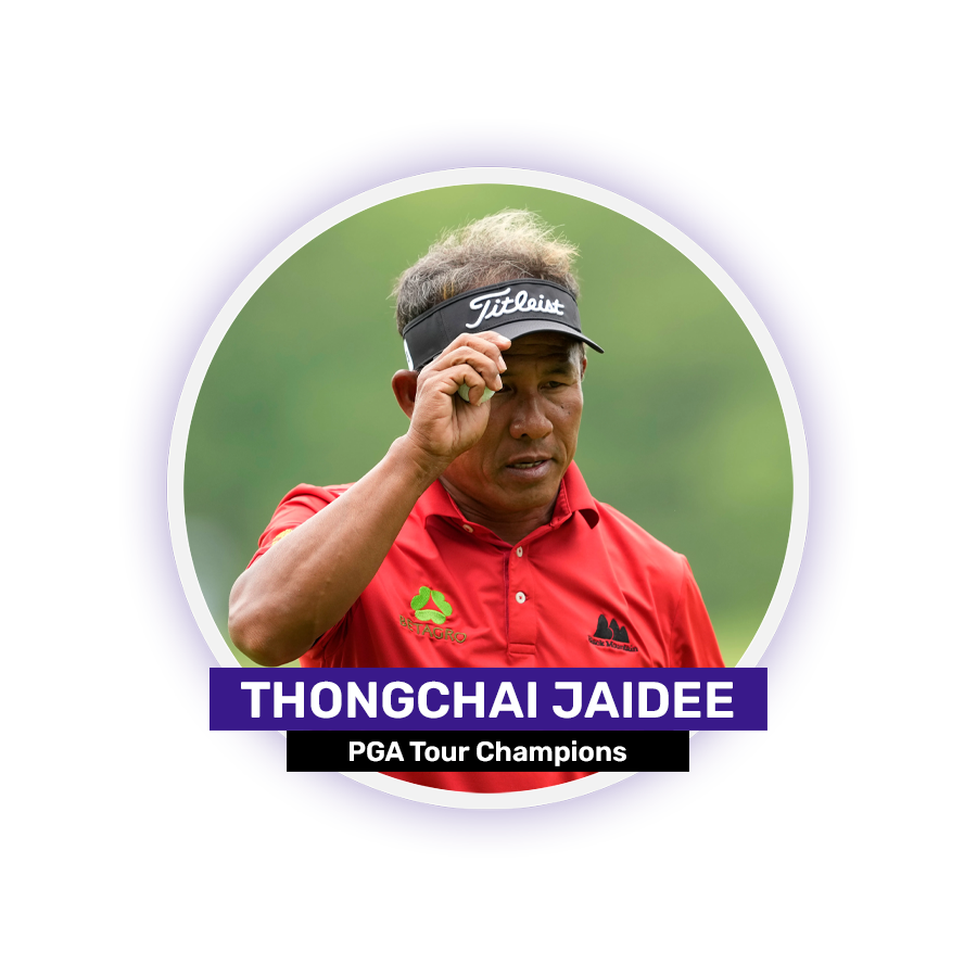 A person in a red shirt, wearing a Titleist visor, against a blurred background with text that reads "THONGCHAI JAIDEE, PGA Tour Champions."