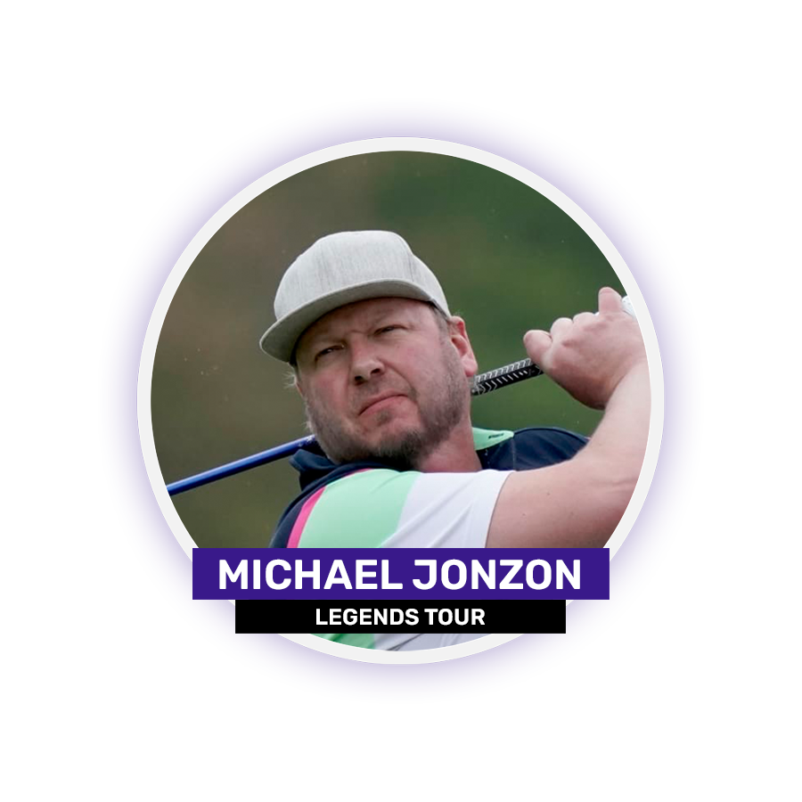 A man wearing a cap is swinging a golf club.