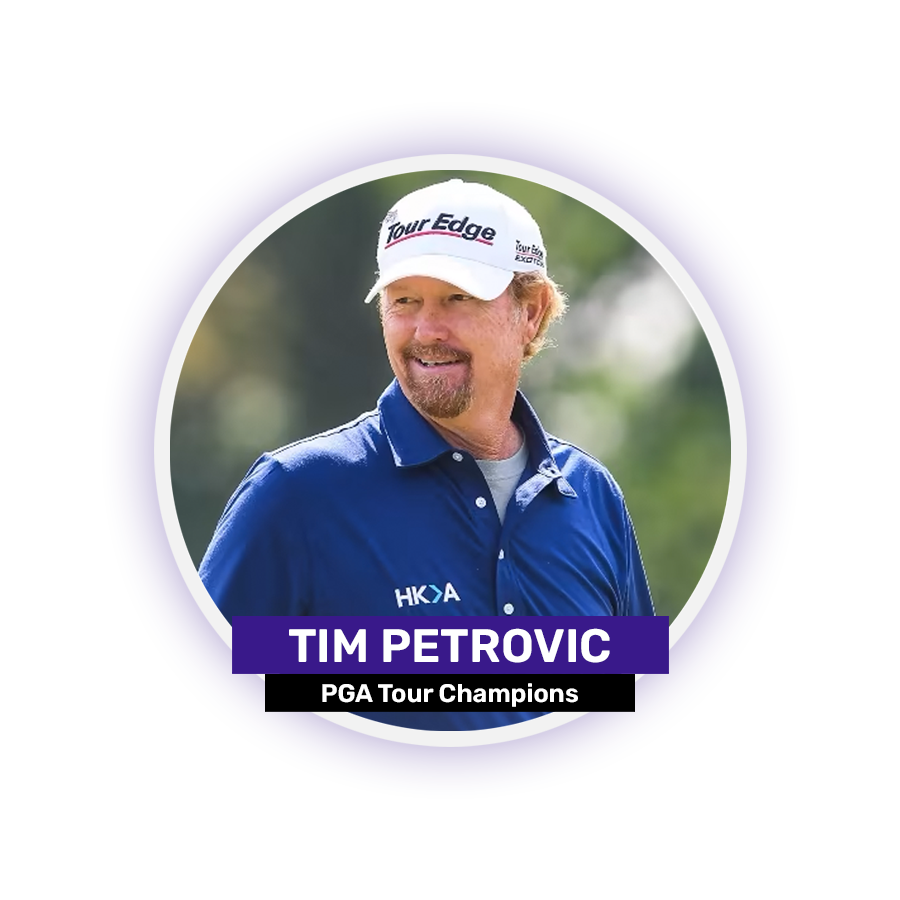 A man wearing a blue shirt and white cap with "Tour Edge" logo, smiling.