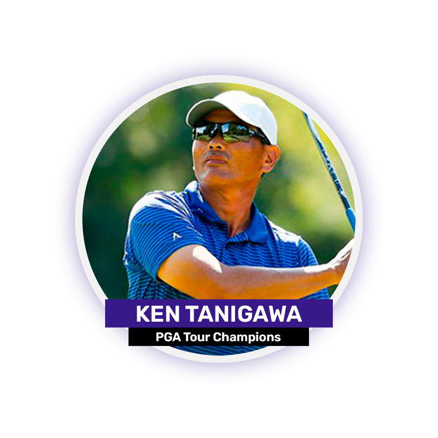 A person wearing sunglasses and a blue shirt is swinging a golf club.